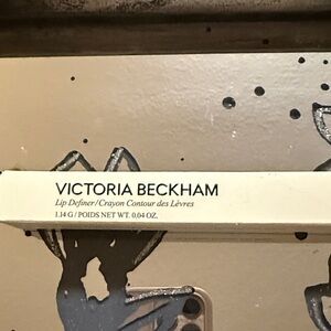 NIB Victoria, Beckham shade three lip defined